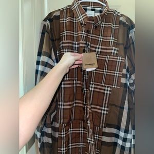 Brand new 2XL Burberry shirt. It still has the tags on it.